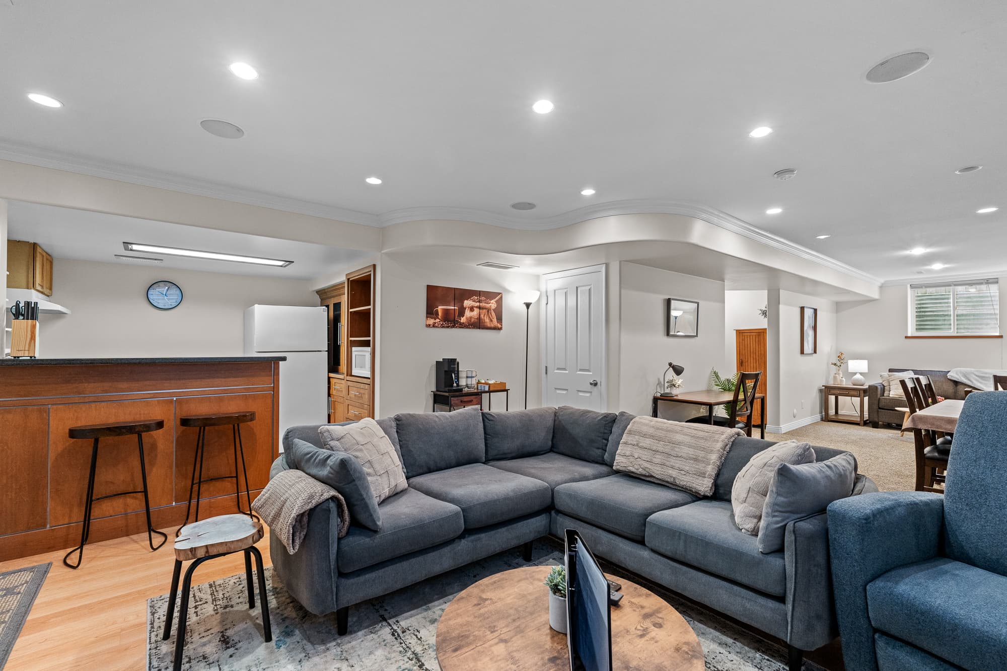 Bright, professionally furnished living area in a Hart Hosting managed short-term rental in Surrey, BC